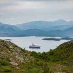 Beautiful view of a cruise ship in a fjord surrounded by mountains in Nordland, Norway., tags: costa mit - pexel